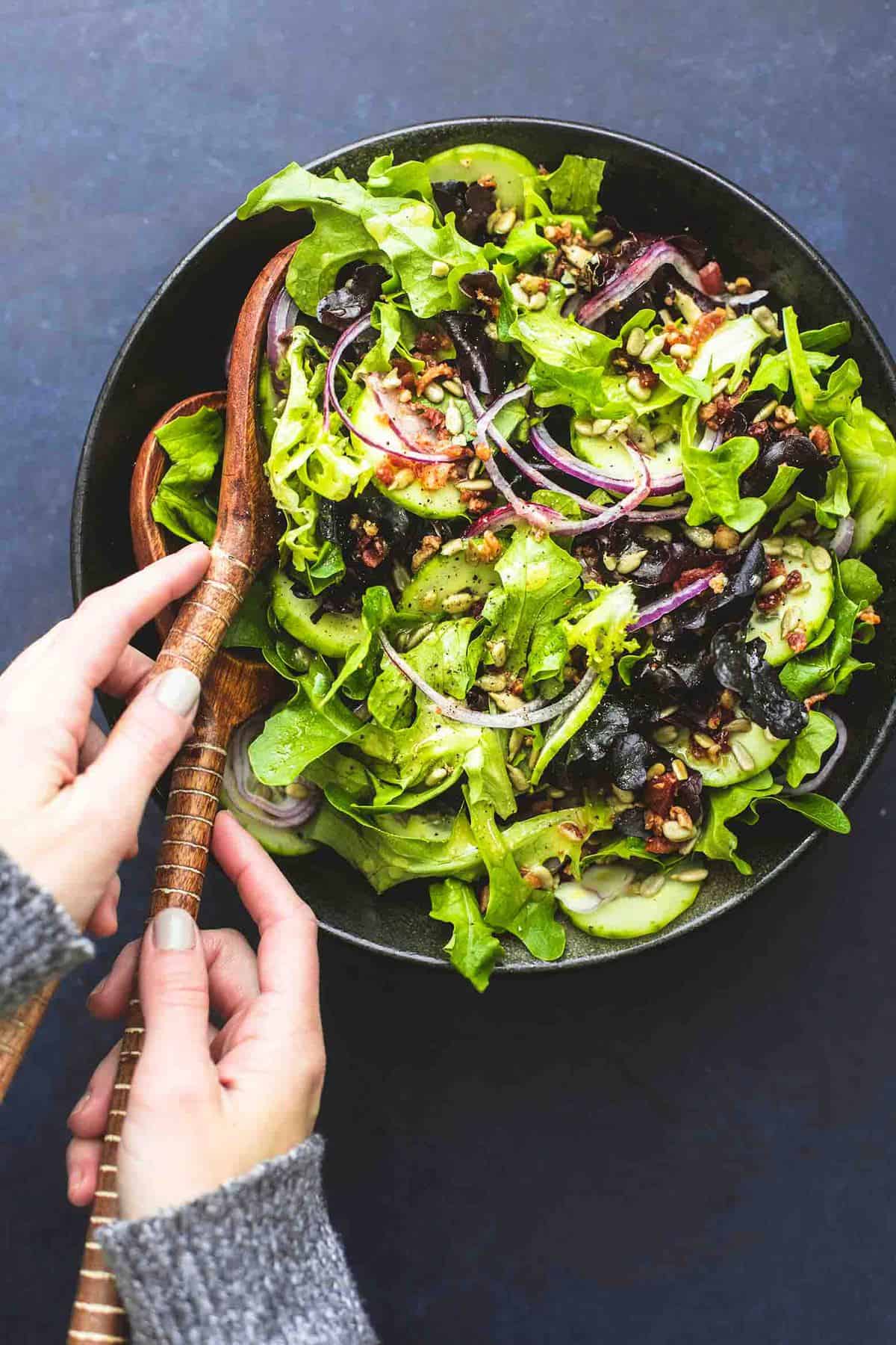 Best Simple Tossed Green Salad is the easiest side dish and goes perfectly with just about anything! Totally customizable and tossed in the tastiest 6-ingredient homemade dressing! | lecremedelacrumb.com