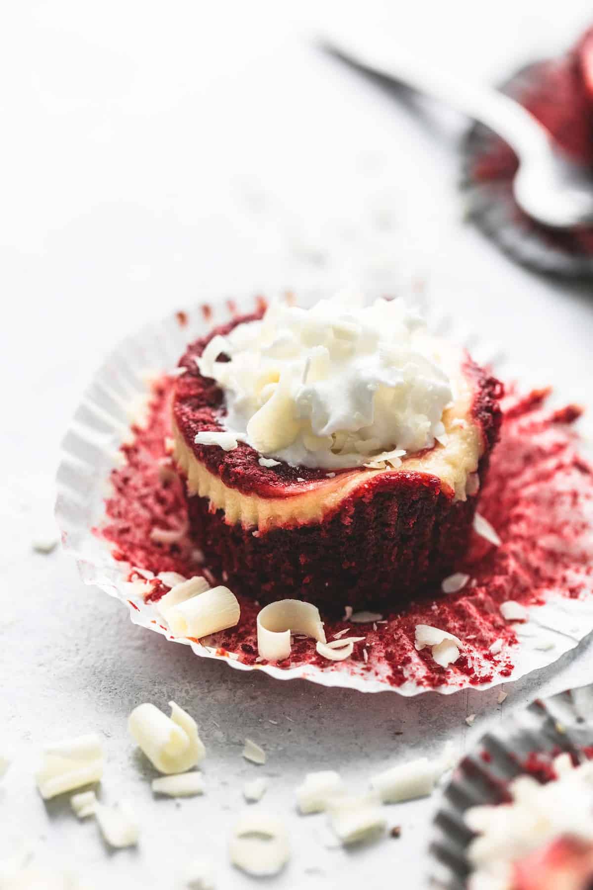 red velvet cheesecake bites in a cupcake liner.