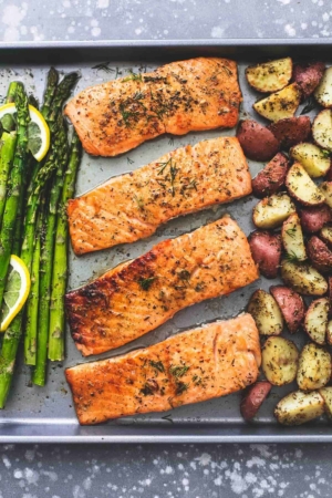 Easy healthy One Sheet Pan Baked Salmon and Asparagus with Potatoes dinner recipe | lecremedelacrumb.com