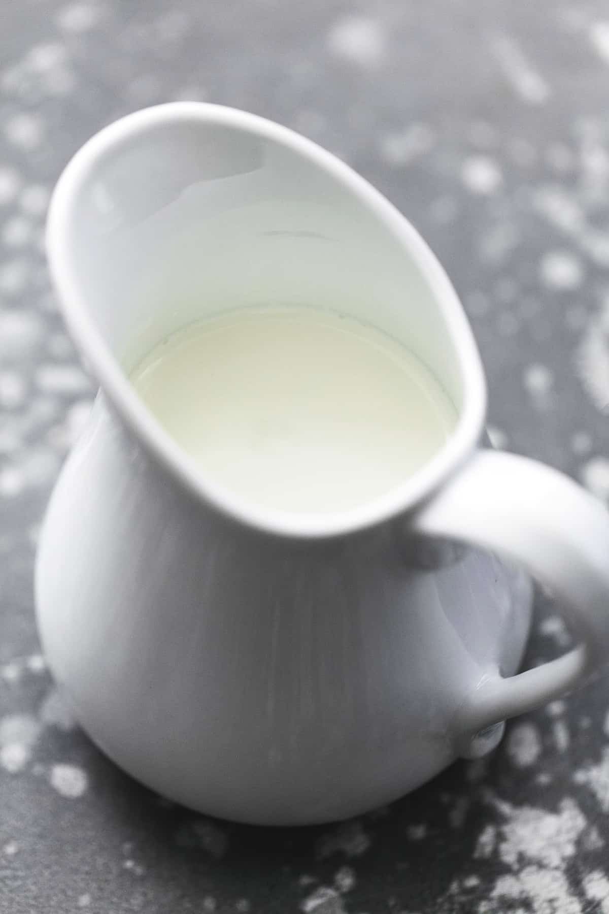 milk in a white pitcher.