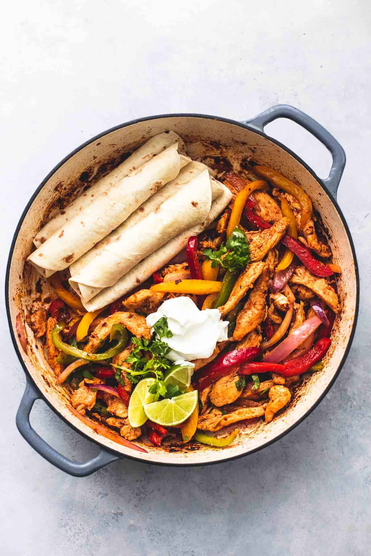 top view of chicken fajitas skillet.