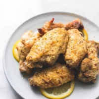 Baked Lemon Pepper Chicken Wings easy appetizer recipe | lecremedelacrumb.com
