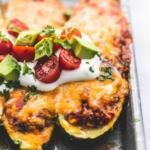 Enchilada Quinoa Stuffed Zucchini Boats easy healthy recipe | lecremedelacrumb.com