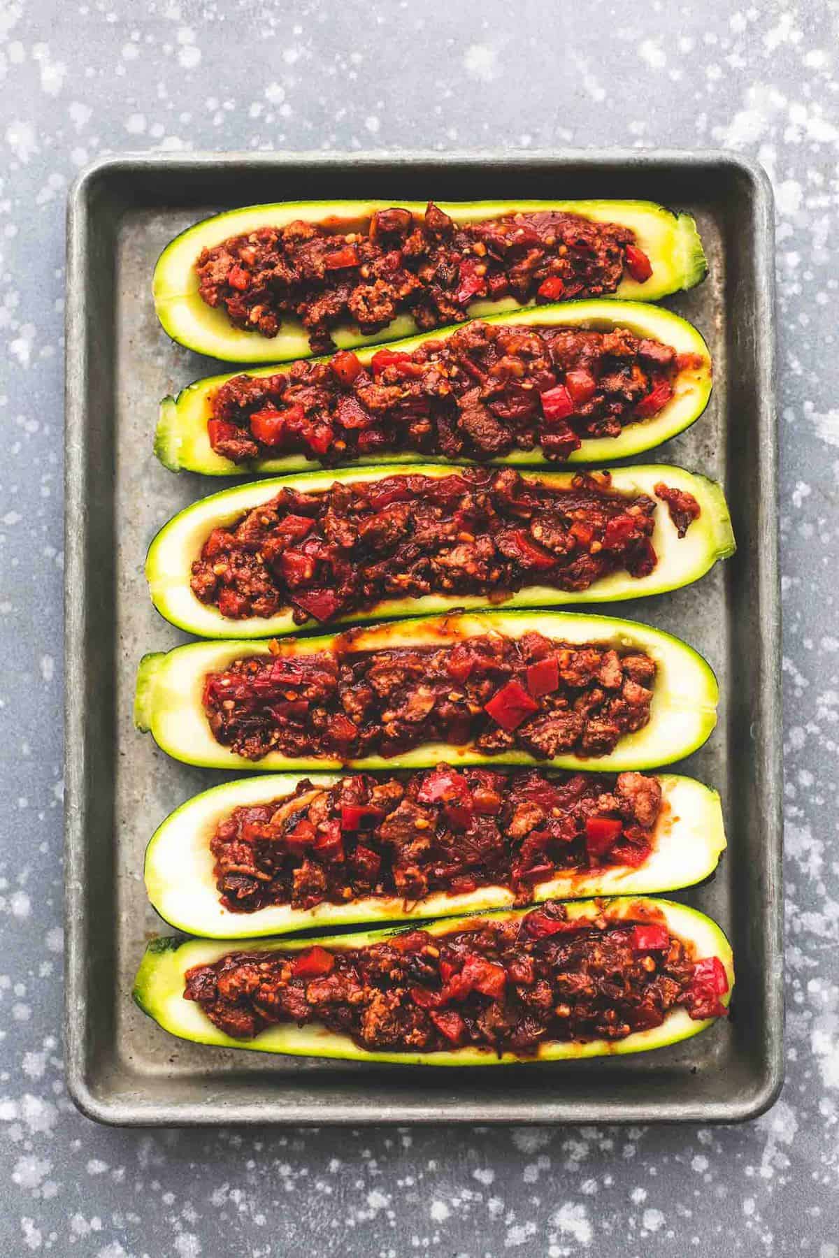 Healthy Italian Stuffed Zucchini Boats recipe | lecremedelacrumb.com