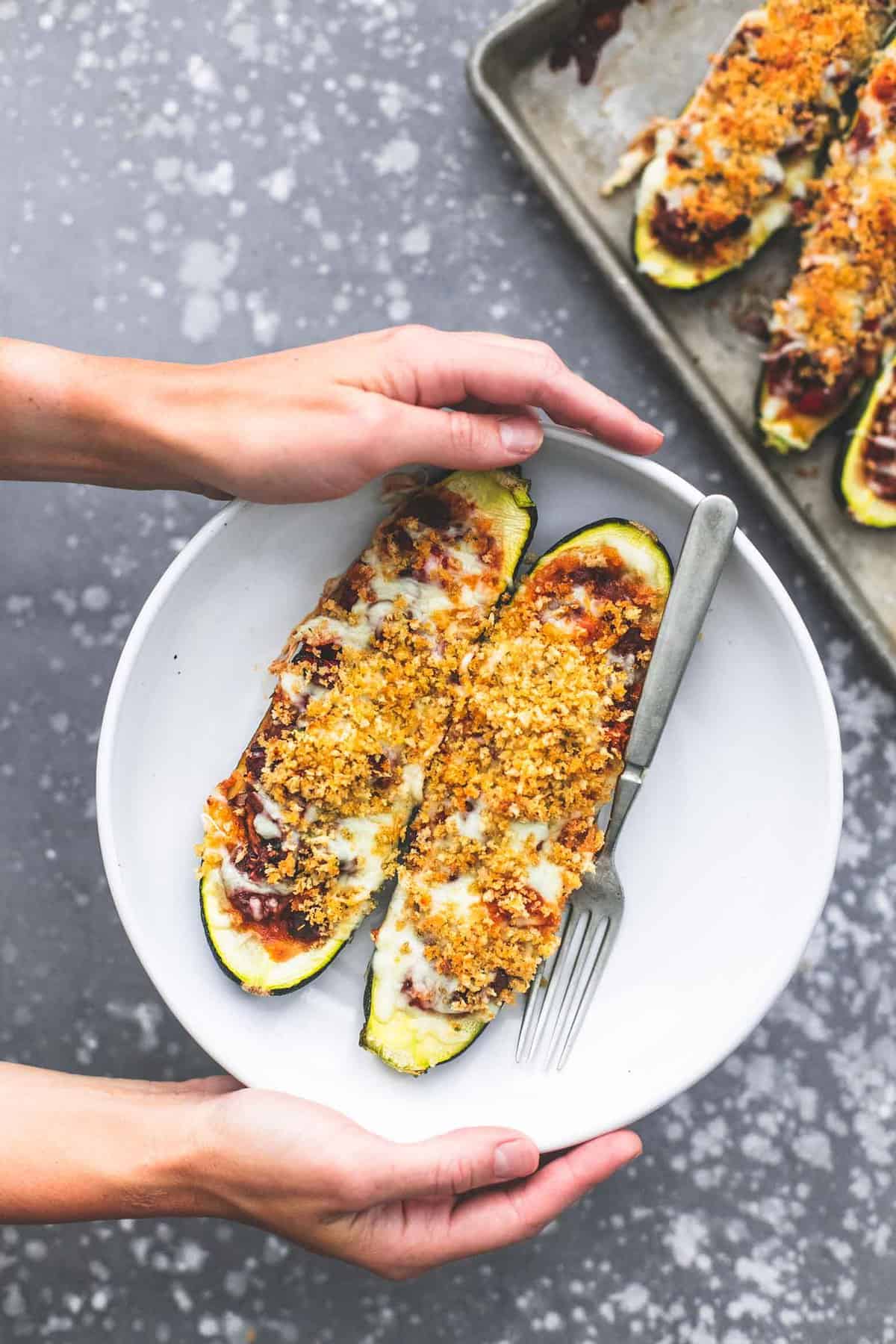 Healthy Italian Stuffed Zucchini Boats recipe | lecremedelacrumb.com