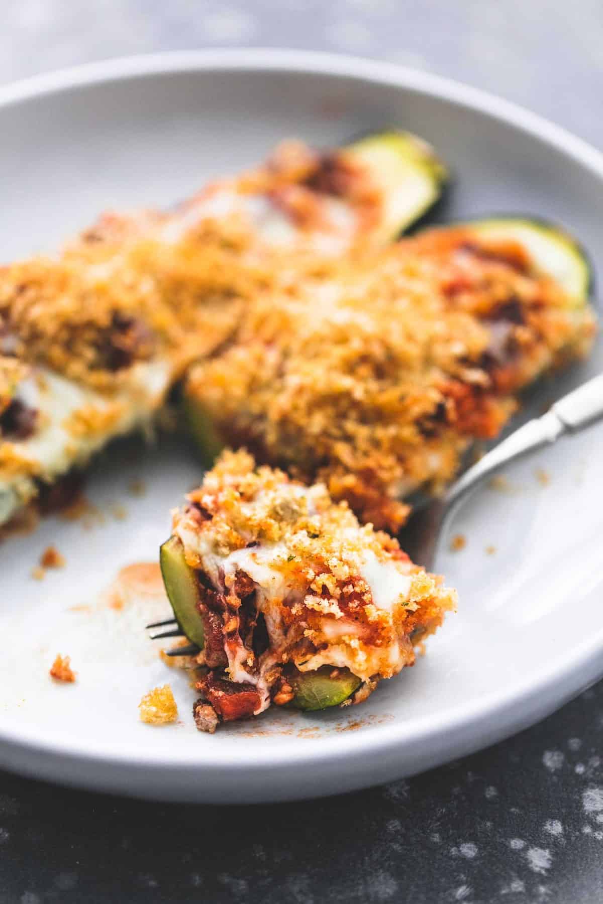 Healthy Italian Stuffed Zucchini Boats recipe | lecremedelacrumb.com