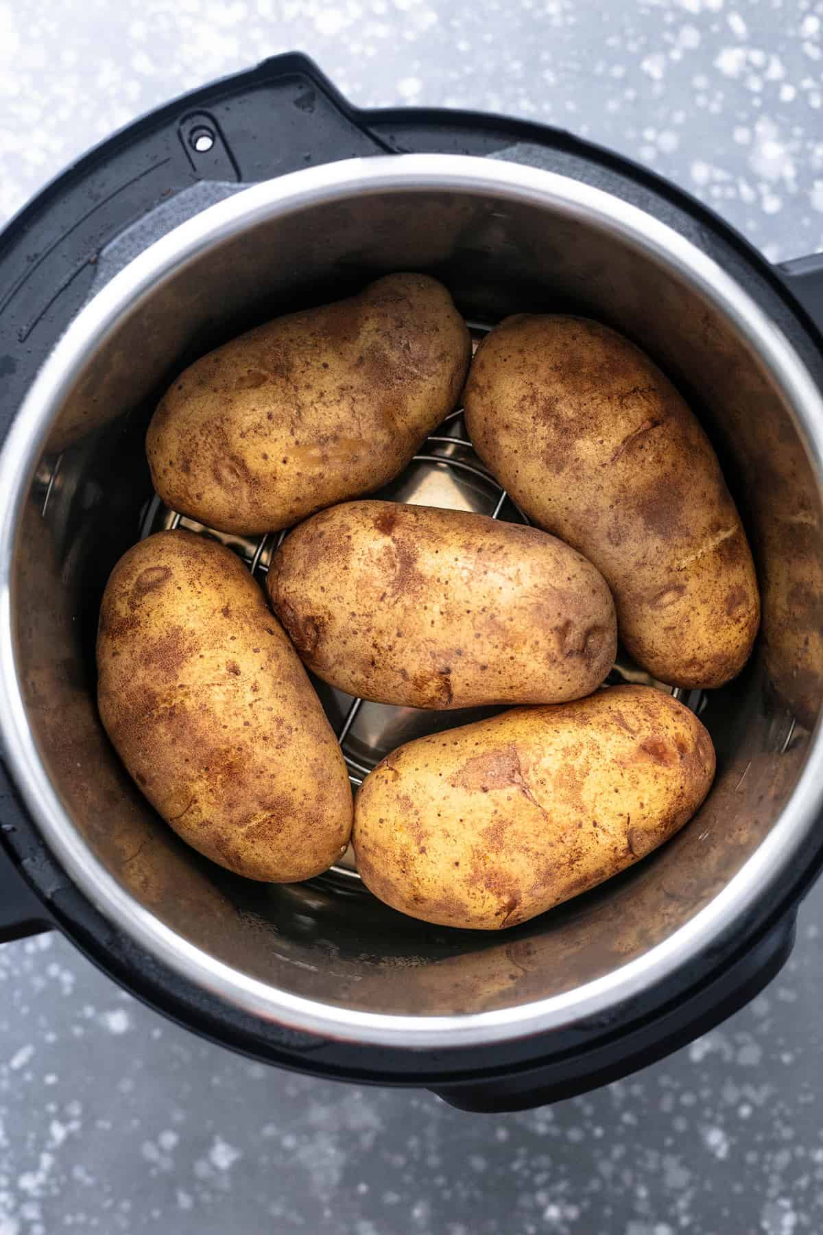 top view of instant pot baked potatoes in an instant pot.