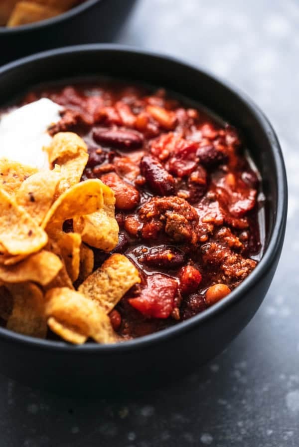 Best ever easy INSTANT POT BEEF CHILI with ground beef, fire roasted tomatoes, and tons of flavor! | lecremedelacrumb.com