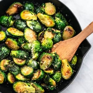 Sauteed Brussels Sprouts Recipe easy side dish with parmesan and garlic | lecremedelacrumb.com
