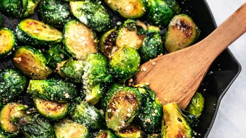 Sauteed Brussels Sprouts Recipe easy side dish with parmesan and garlic | lecremedelacrumb.com