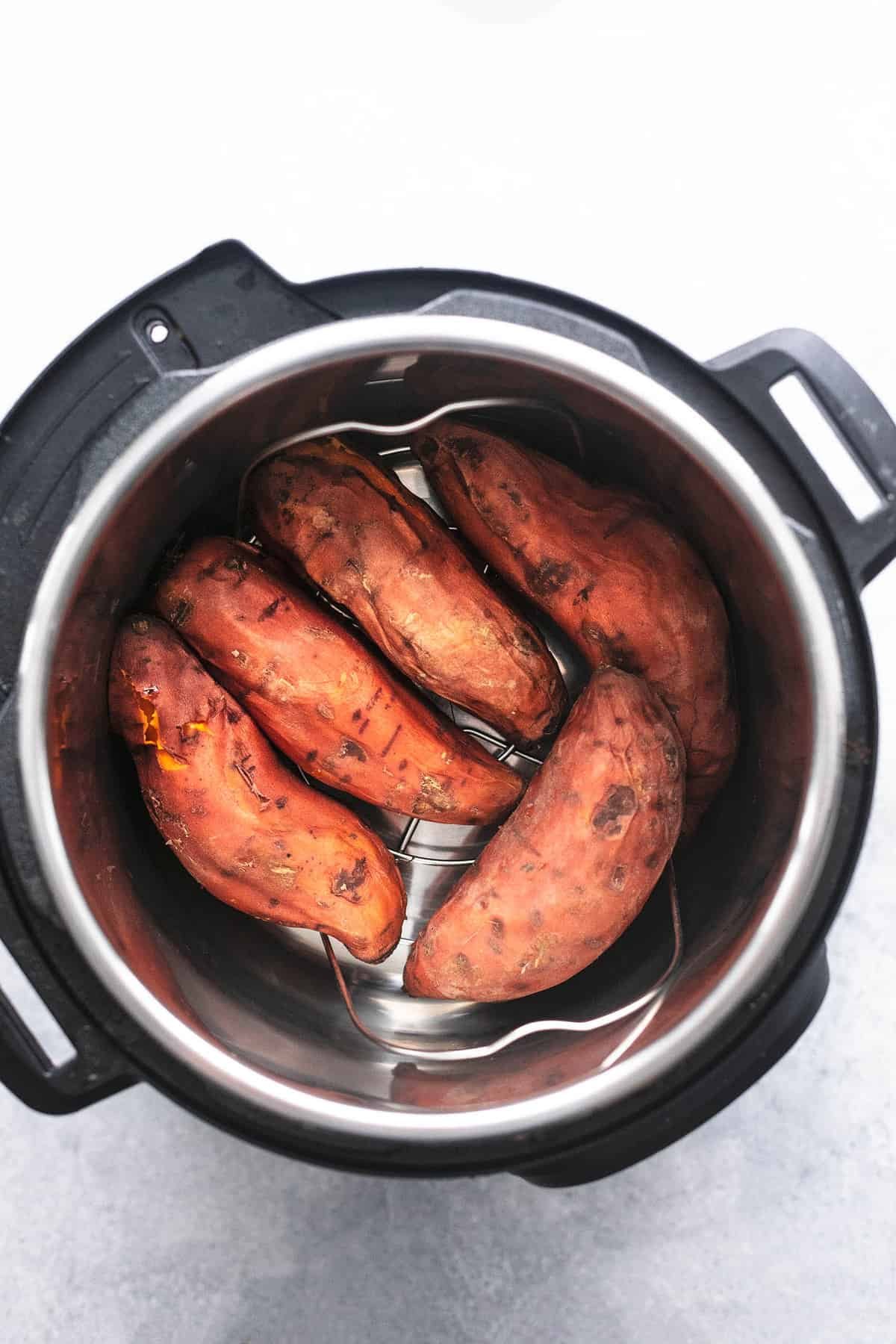 top view of instant pot baked sweet potatoes in an instant pot.