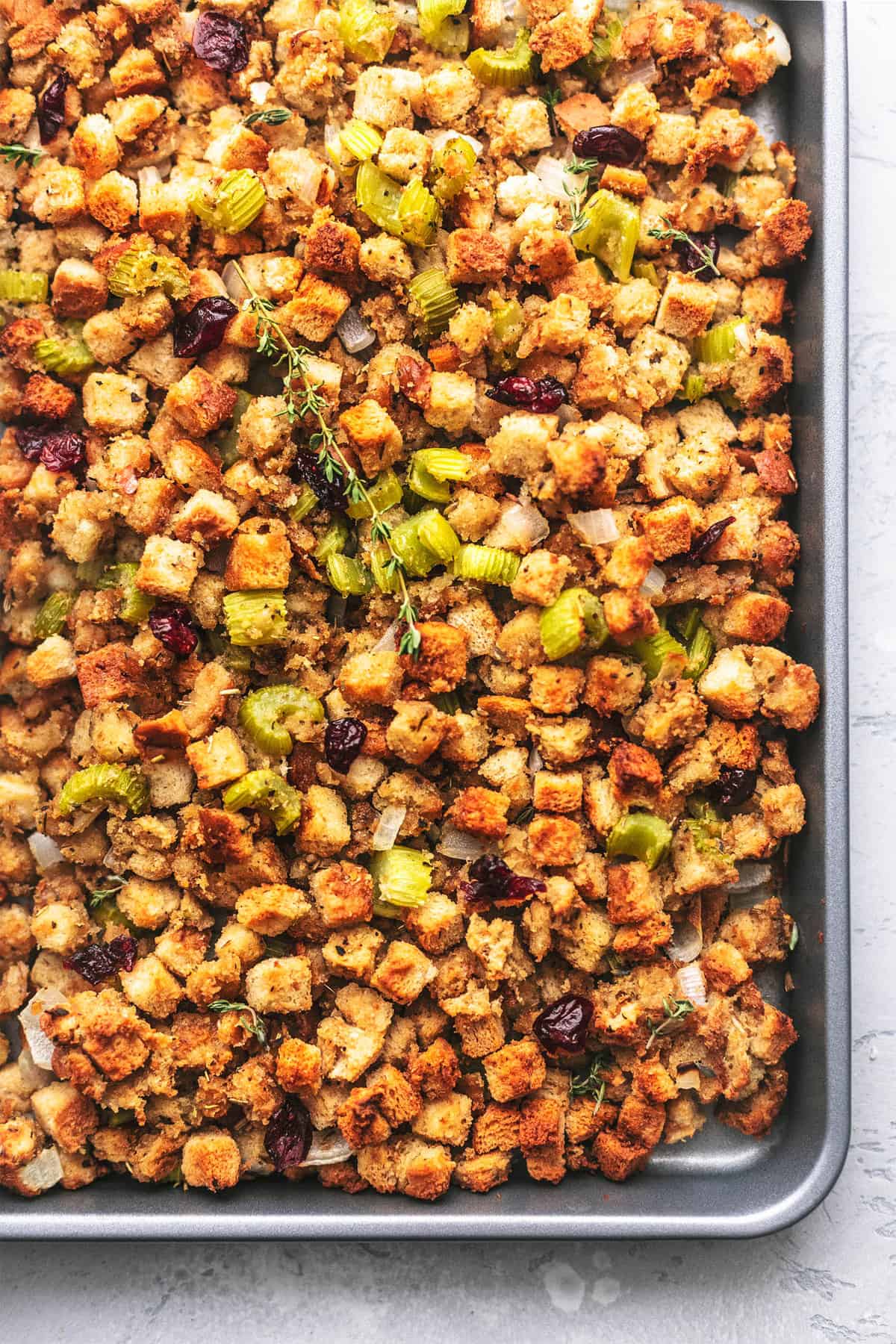 close up top view of sheet pan cranberry stuffing.