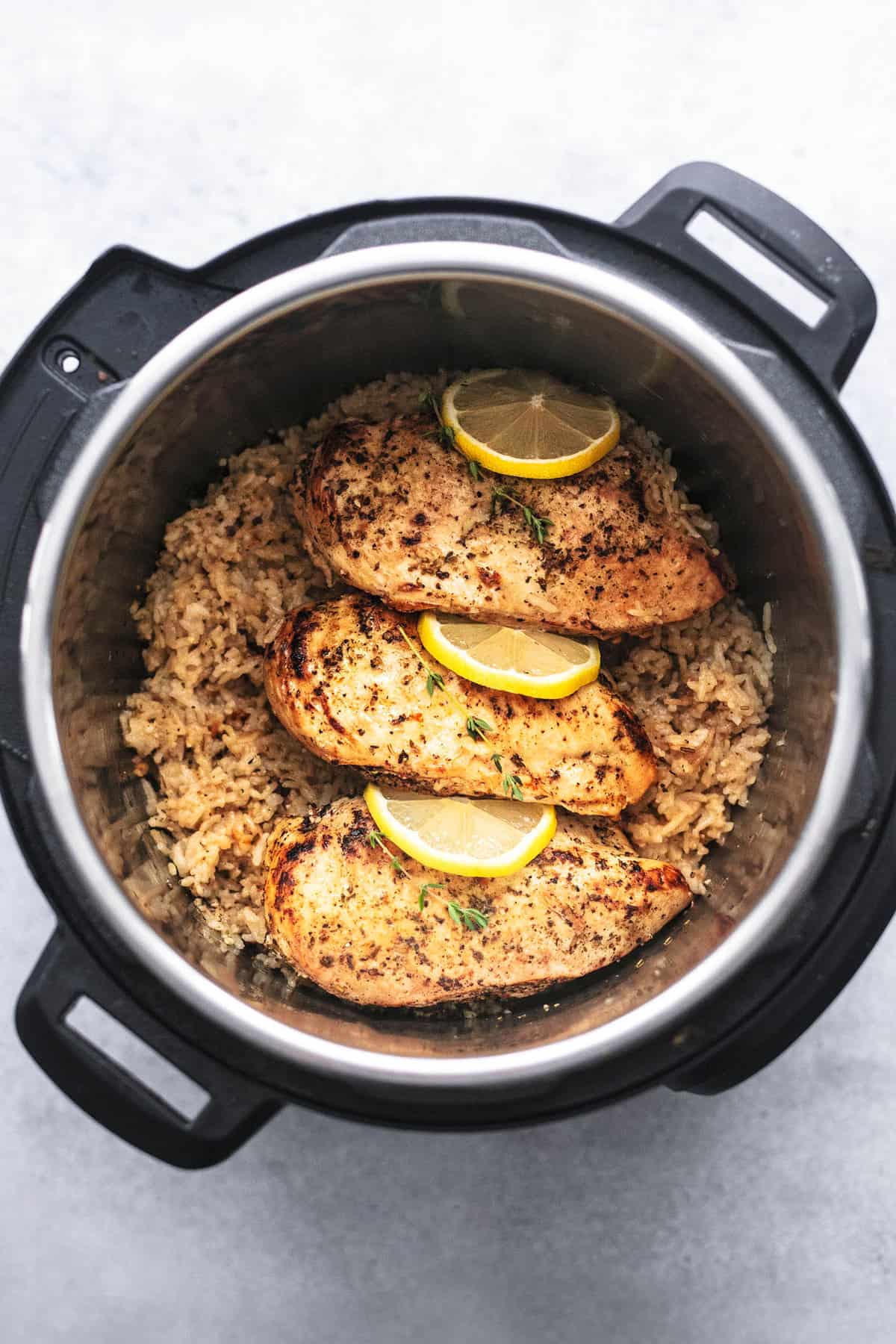 top view of instant pot chicken breast and rice in an instant pot.