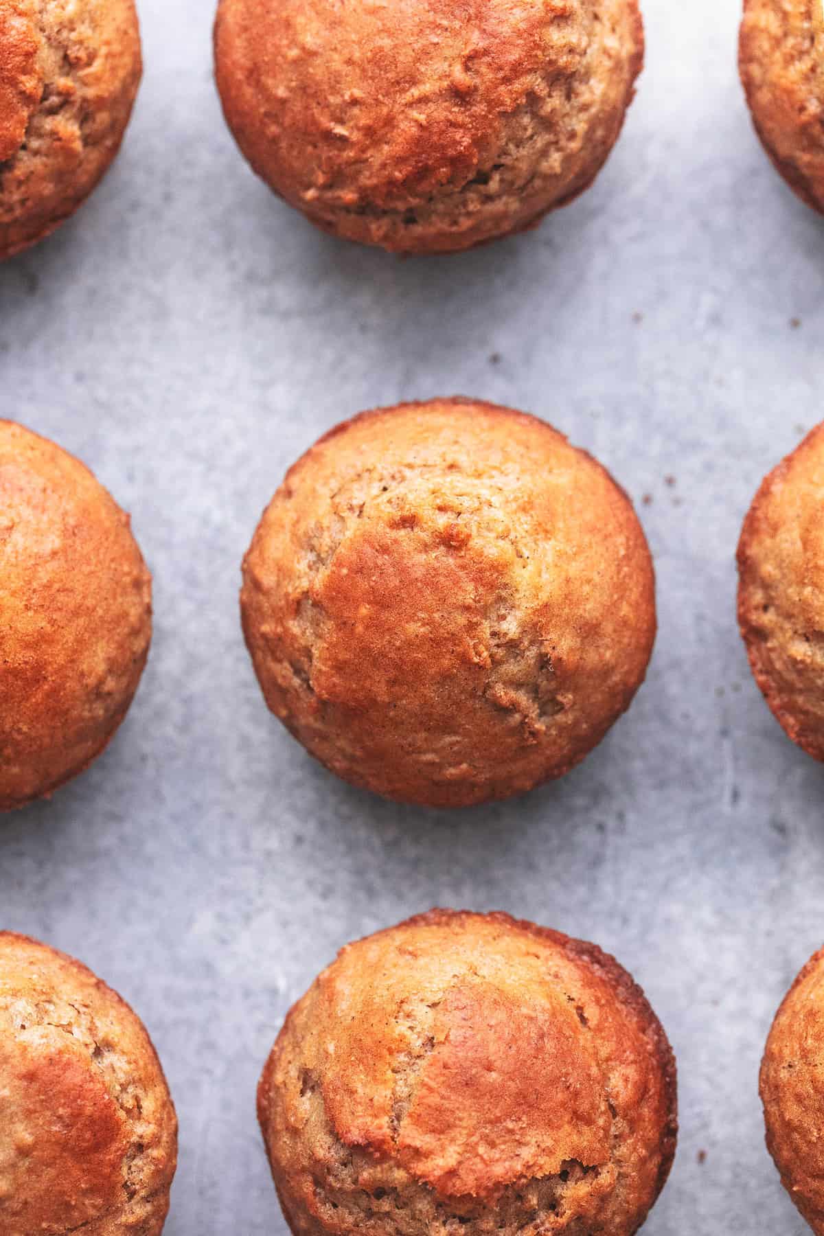 top view of bran muffins on a gray background