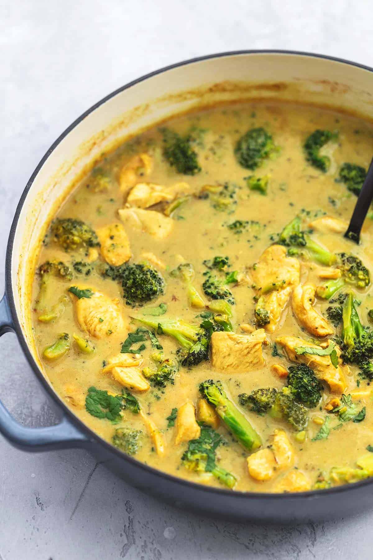 chicken curry with broccoli in a pot