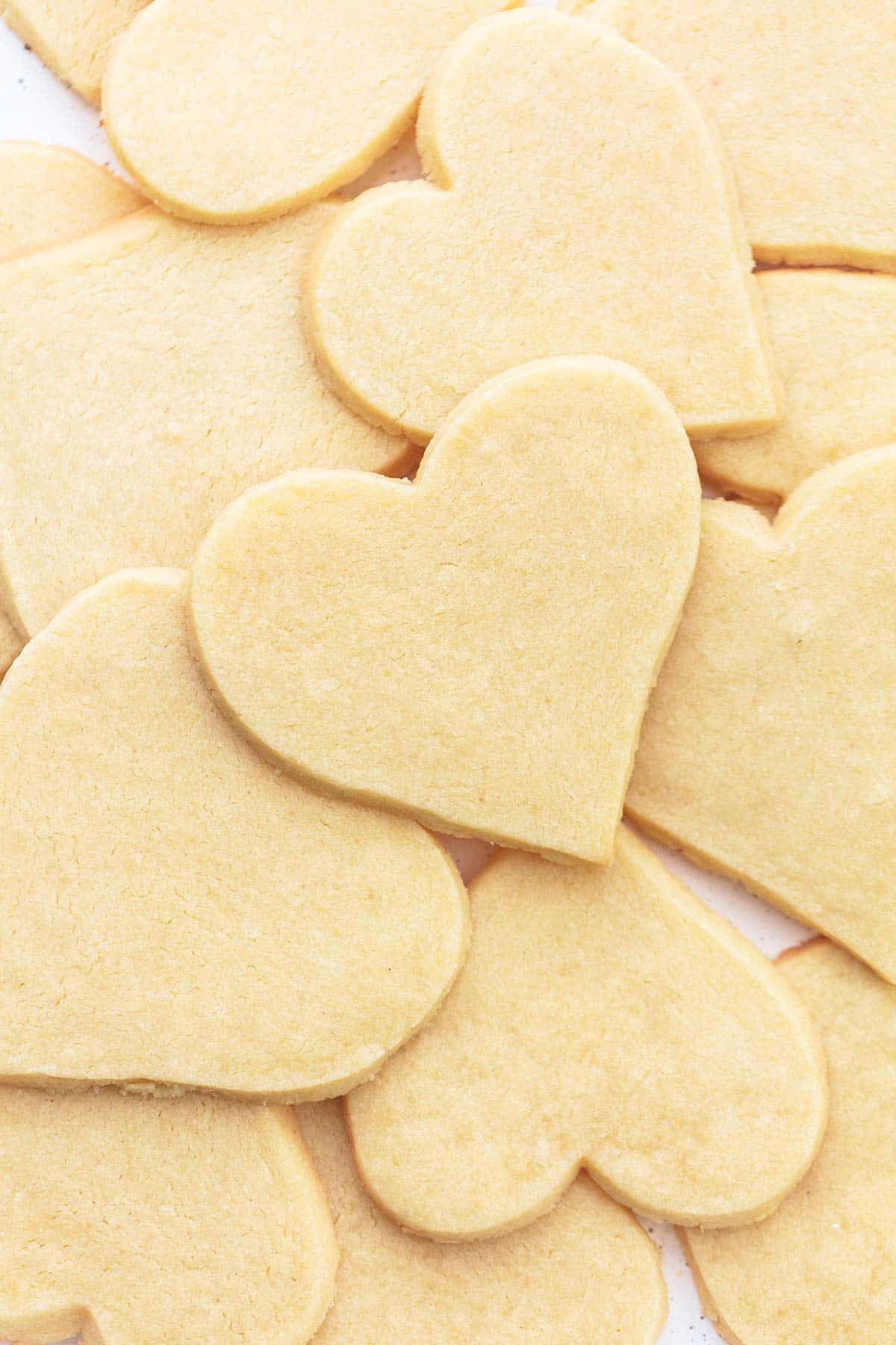 top view of baked heart-shaped sugar cookies.