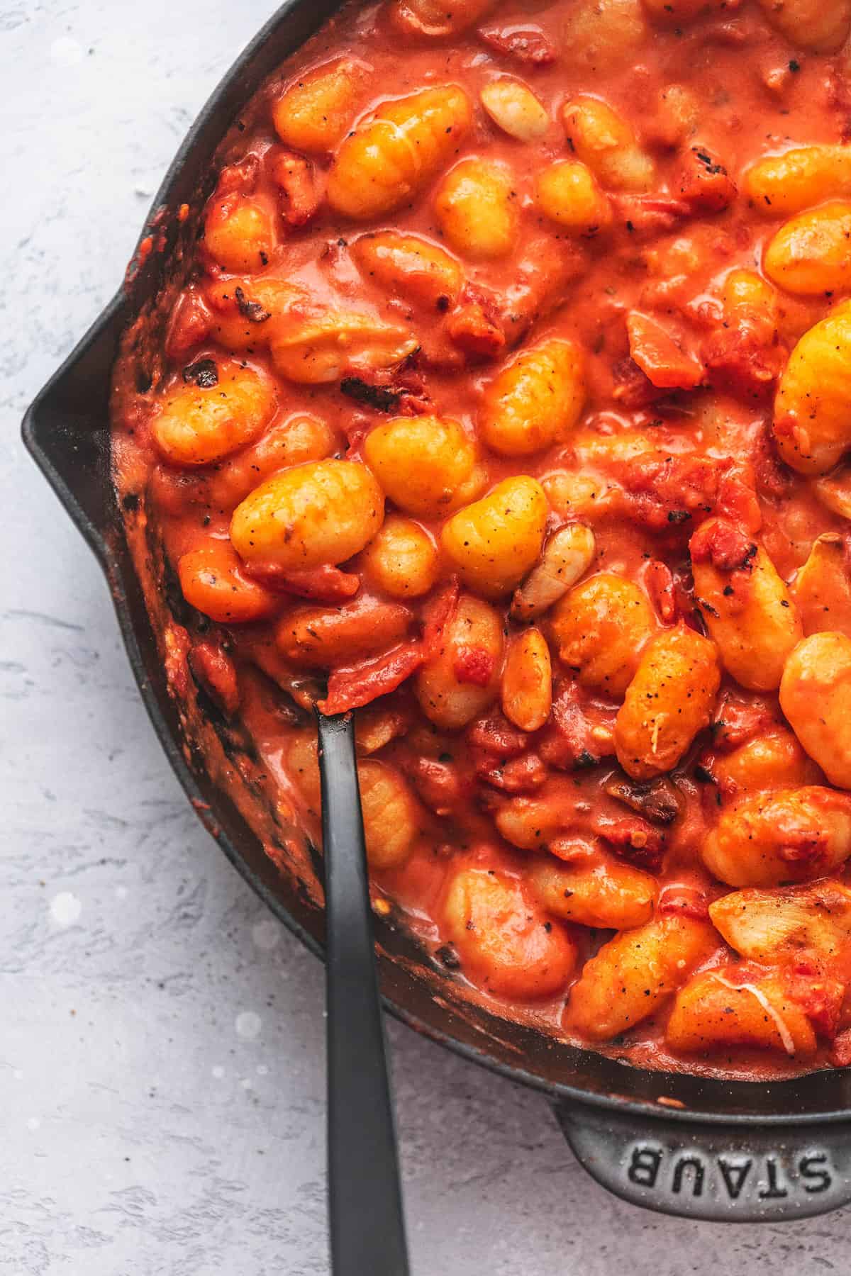 up close gnocchi with tomato sauce in a skillet