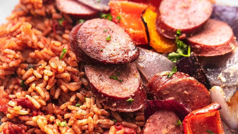 up close sausage and vegetables and rice