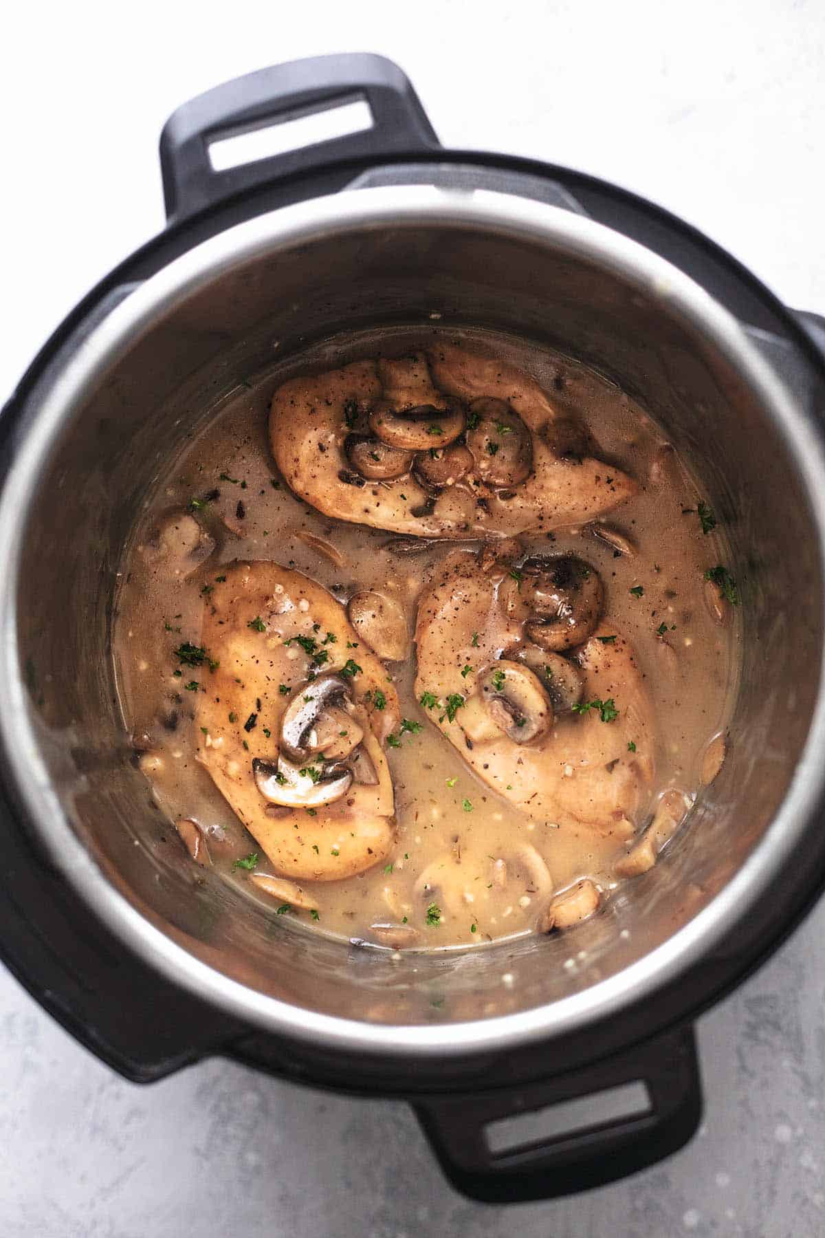 top view of instant pot chicken marsala in an instant pot.