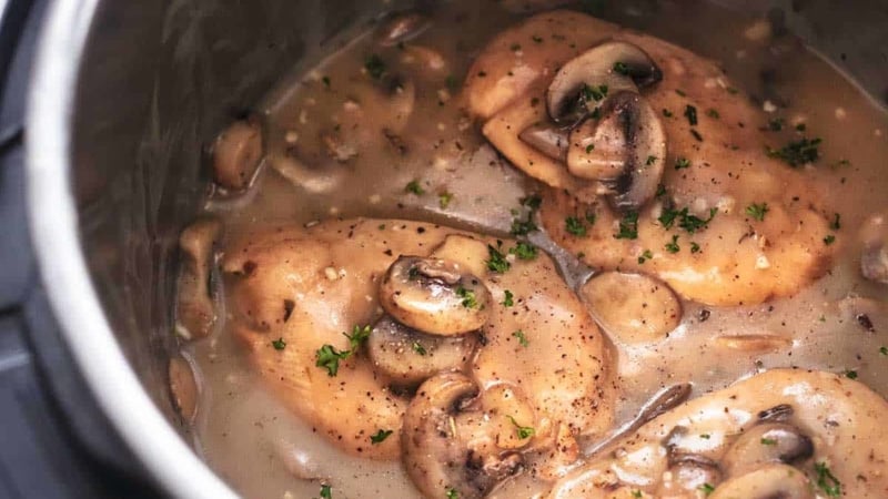 chicken with mushrooms and gravy in pressure cooker pot