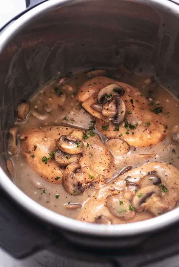 chicken with mushrooms and gravy in pressure cooker pot