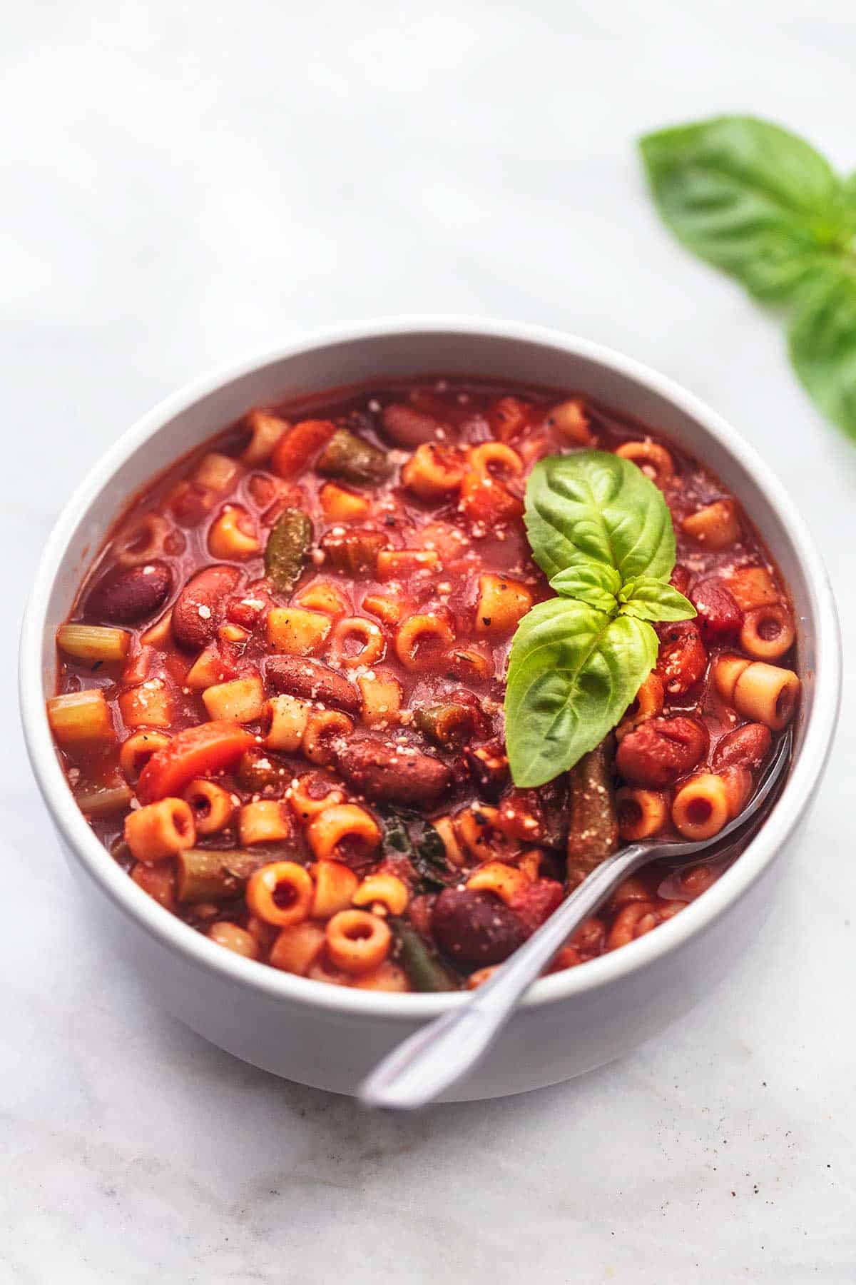 italian minestrone soup with spoon in a bowl