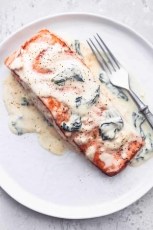 salmon florentine with a fork on a plate