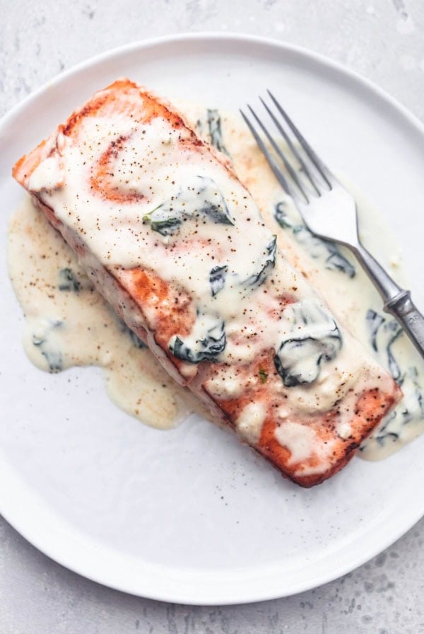 salmon florentine with a fork on a plate