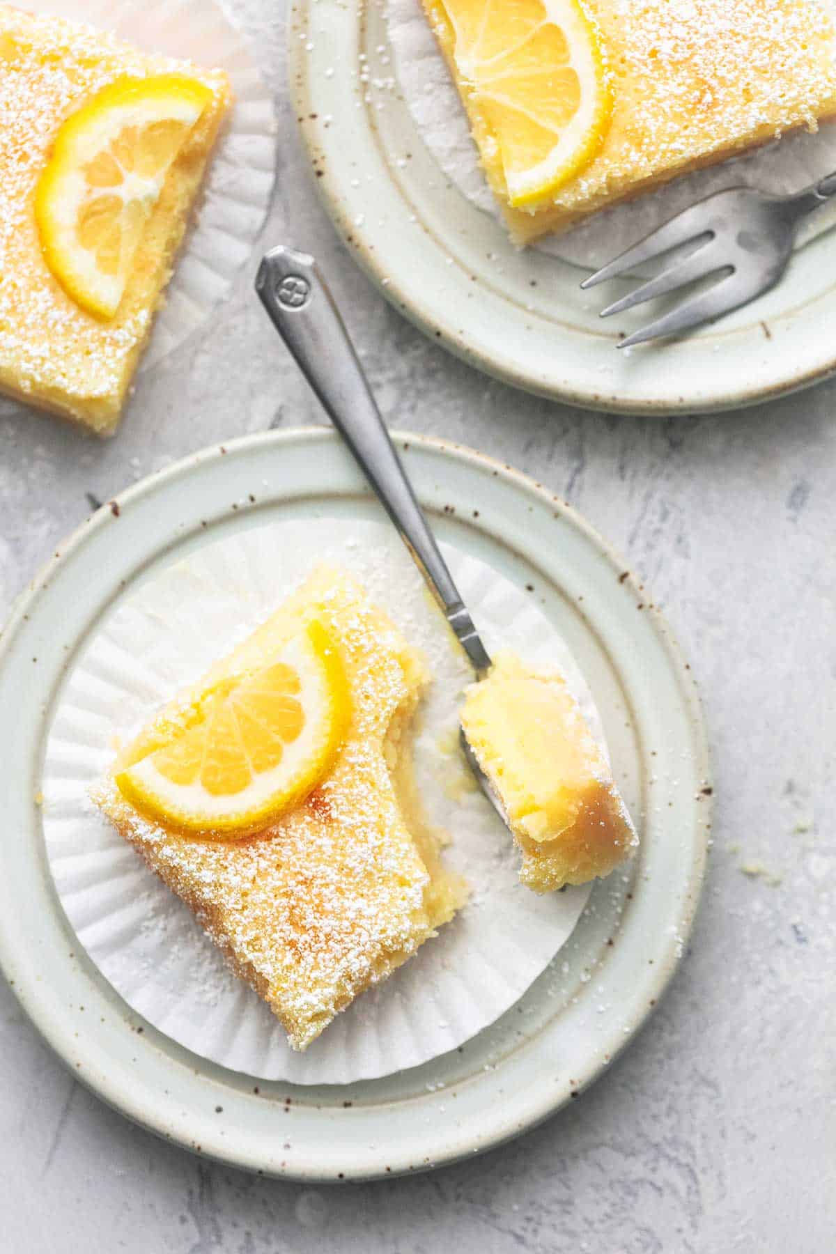 one serving of lemon bars with fork