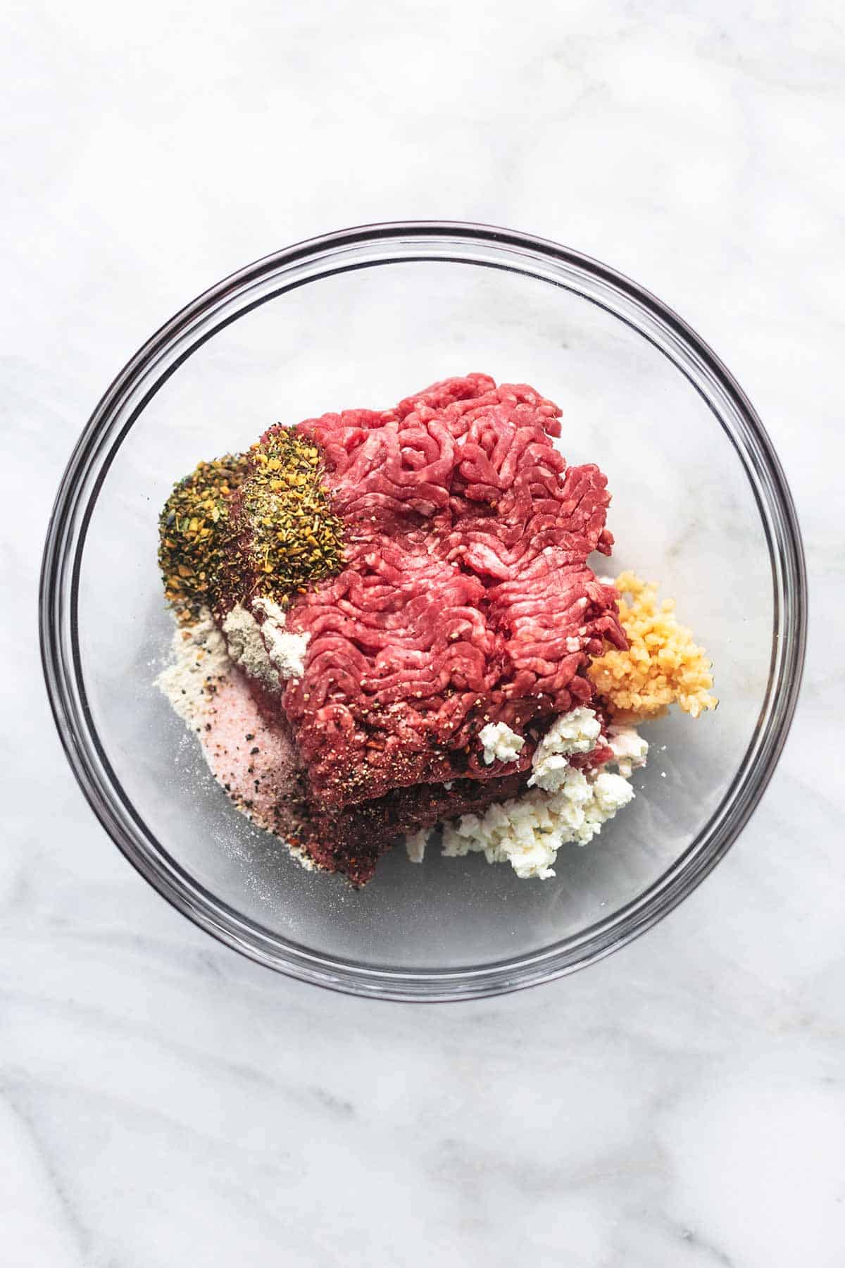 top view of hamburger ingredients in a bowl.