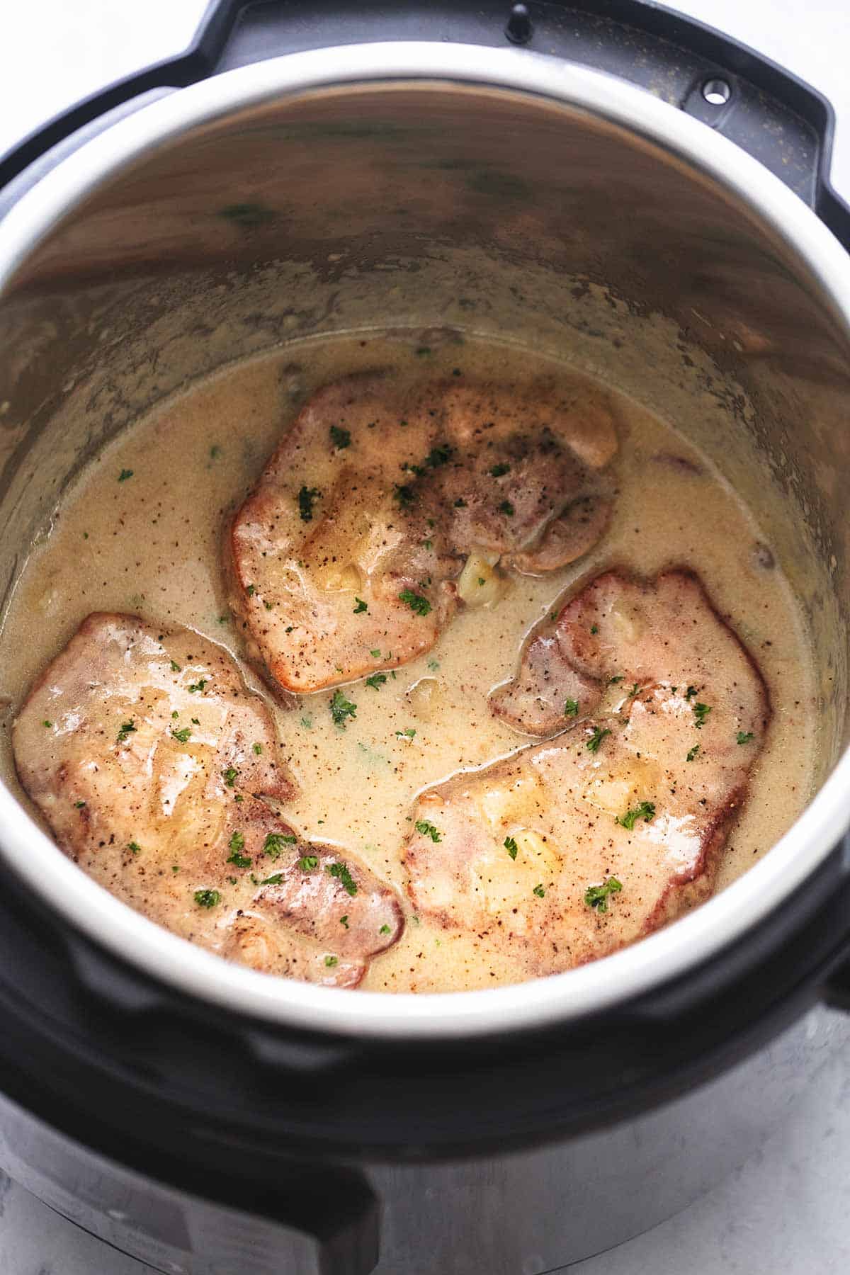 instant pot pork chops with gravy in an instant pot.