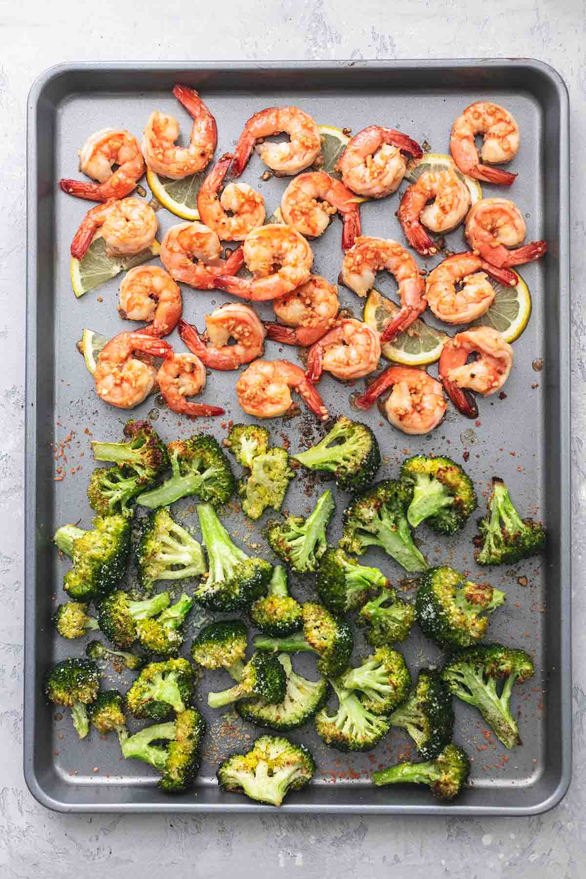 top view of sheet pan shrimp scampi and broccoli on a sheet pan.
