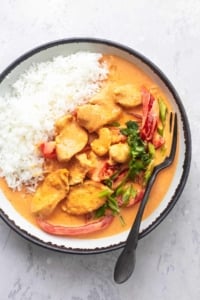 thai curry overhead in bowl with rice and fork