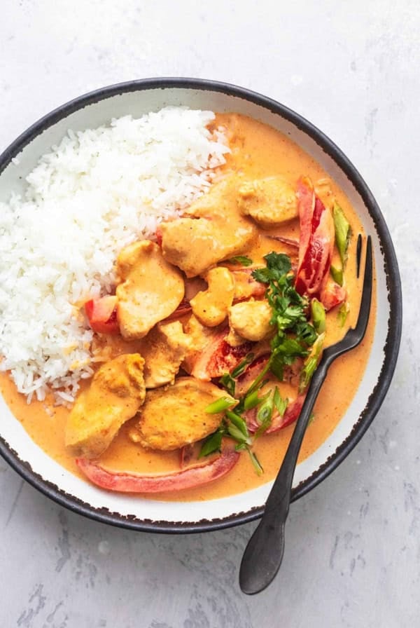 thai curry overhead in bowl with rice and fork