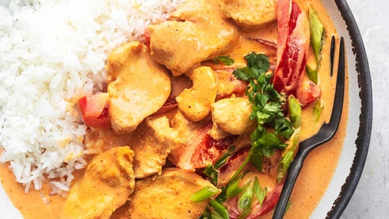 thai curry overhead in bowl with rice and fork