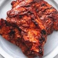 up close bbq pork chops on plate