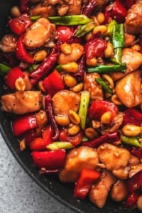 up close kung pao chicken in skillet