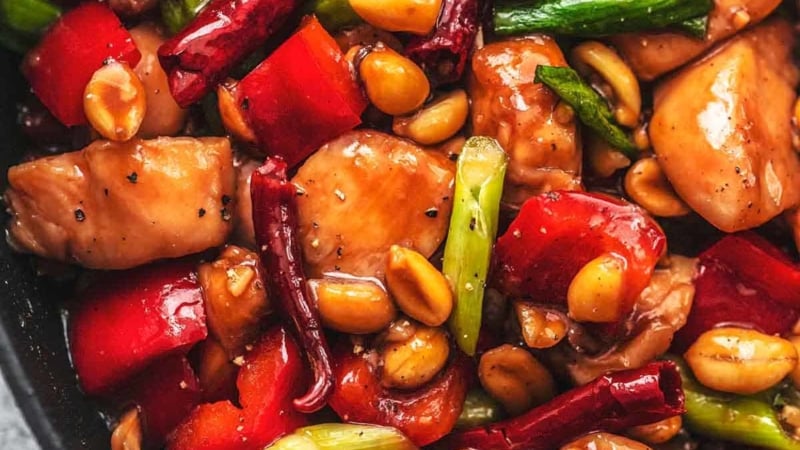 up close kung pao chicken in skillet