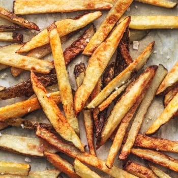 overhead french fries with salt on sheet pan