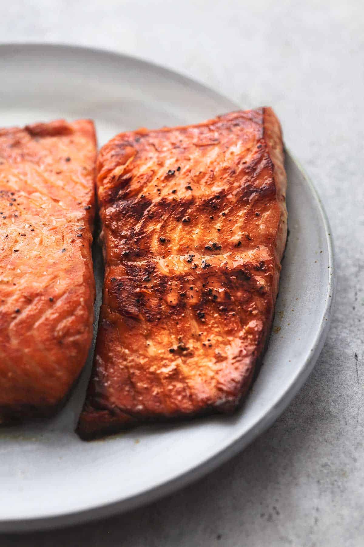 close up of cooked salmon on a plate.