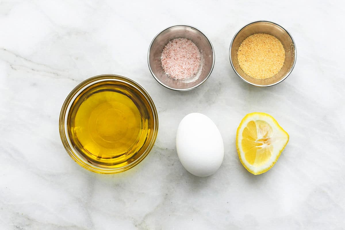 top view of garlic aioli ingredients.