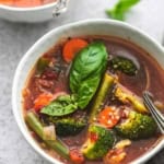 up close three quarter view of vegetable soup in a bowl