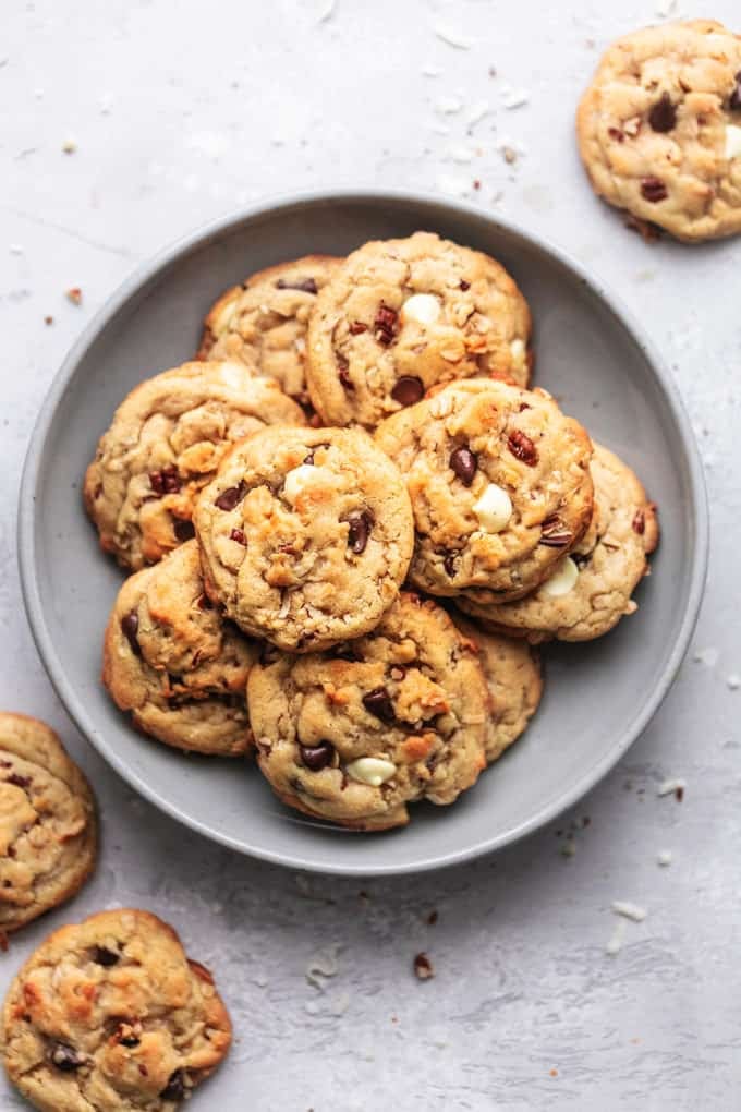 plate of cookies with a few cookies scattered around