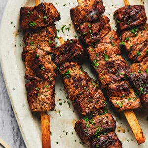 grilled beef kebabs on plate.