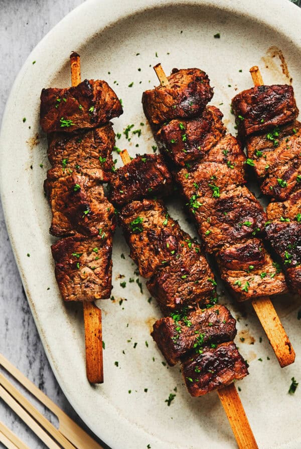 grilled beef kebabs on plate.