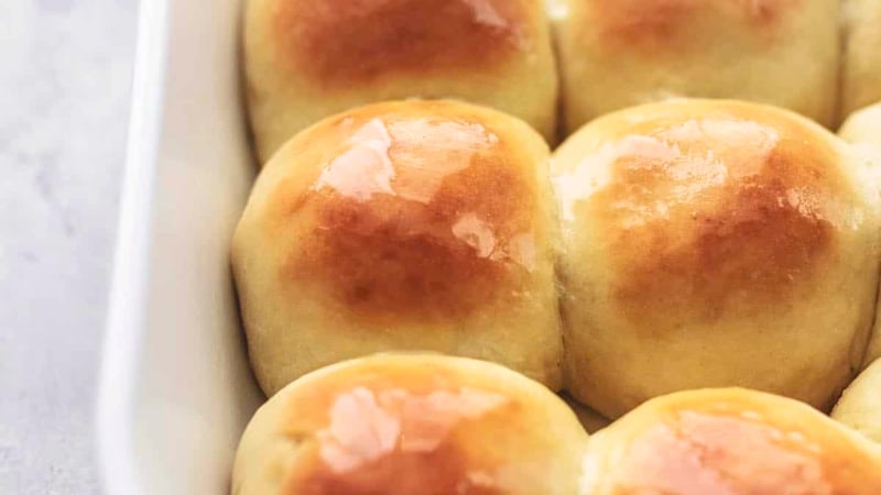 up close dinner rolls in white baking dish