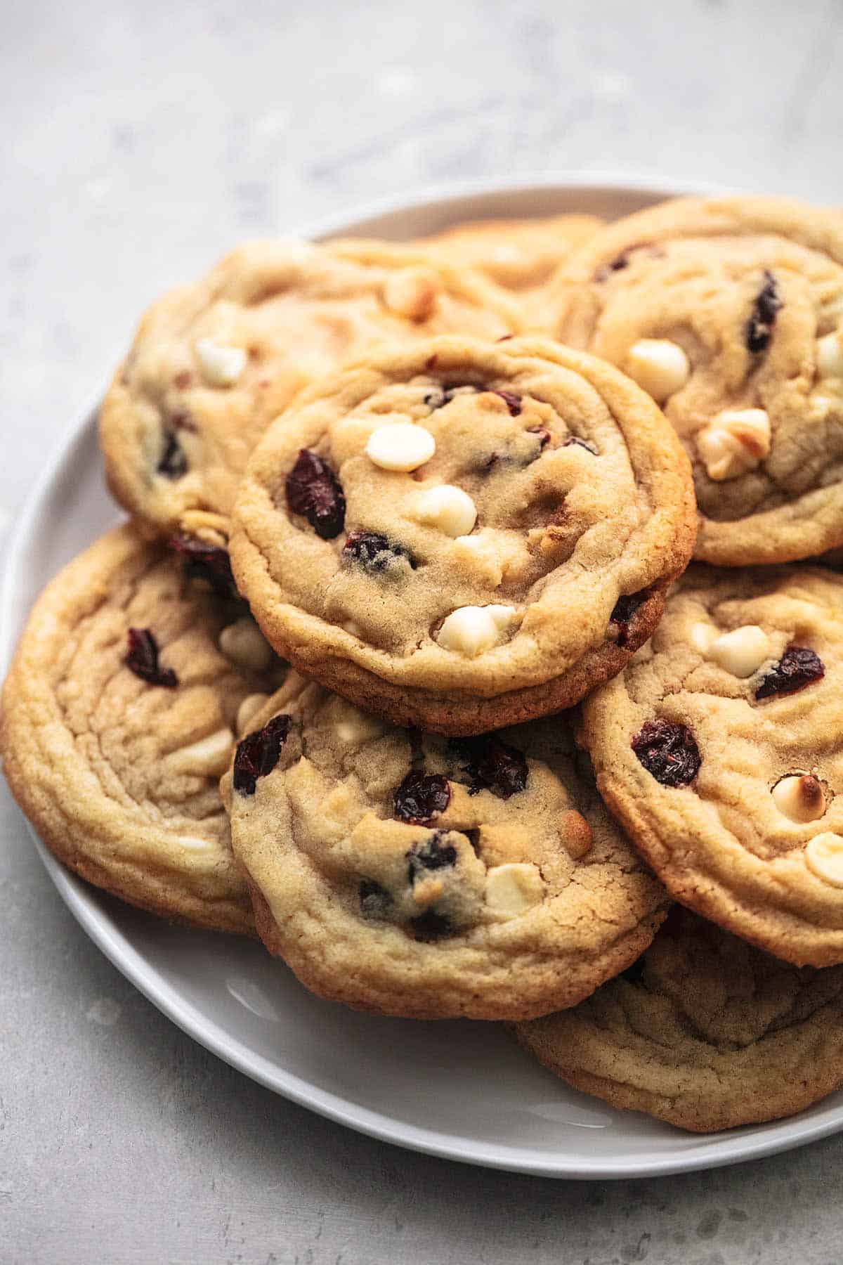 white chocolate cranberry cookies on a plate.