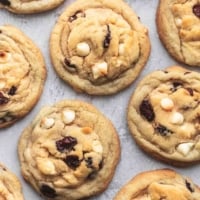 overhead view of golden brown cookies laid flat on a blue surface