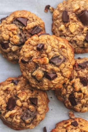 overhead view of six walnut and chocolate banana cookies