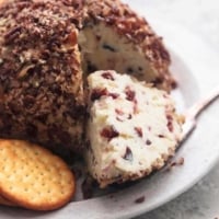 cheeseball wedge on white plate